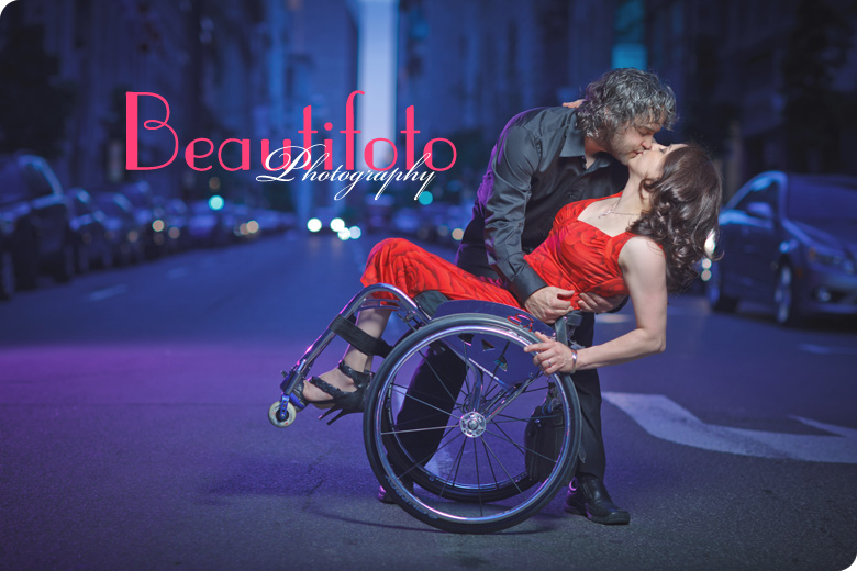 The groom dips his bride in a passionate kiss in the street of Montreal