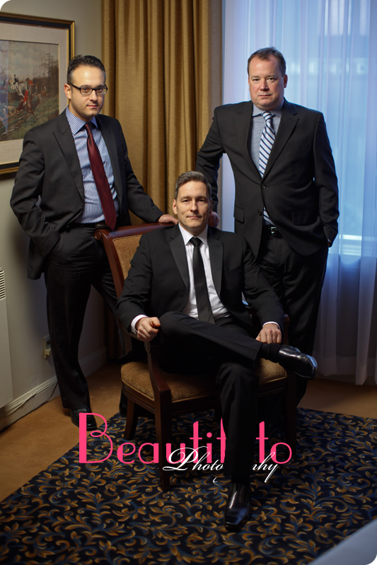 The groom sitting with his ushers beside him.