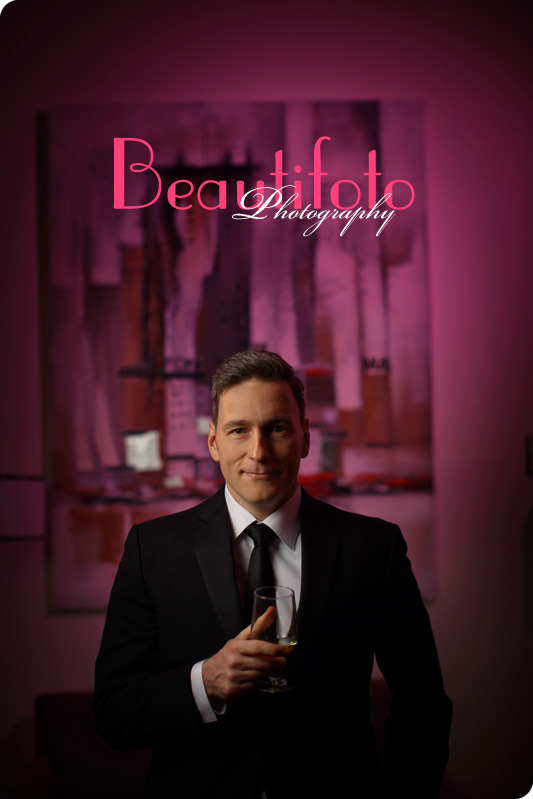 Groom infront of painiting at club Saint James in Montreal