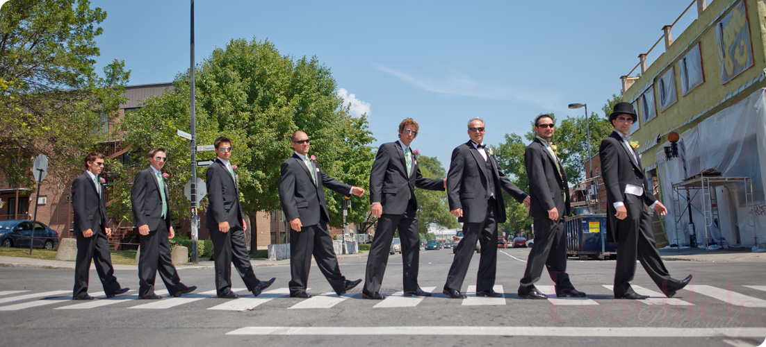 groom with the ushers crossing the road beatles style