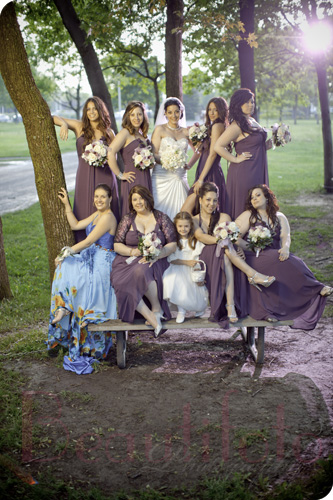 Greek bridal party on a bench